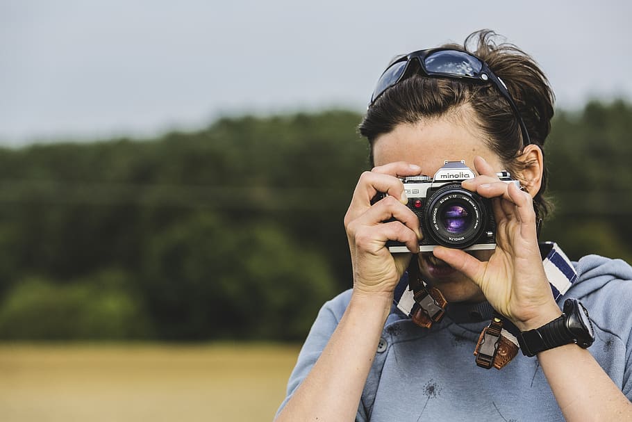 Man Holding Gray and Black Dslr Camera, blur, boy, classic, close-up HD wallpaper