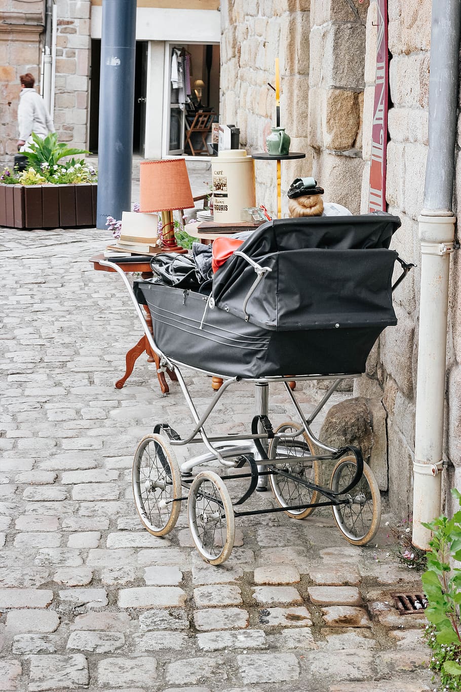 black stroller near wall, person, human, machine, wheel, walkway HD wallpaper