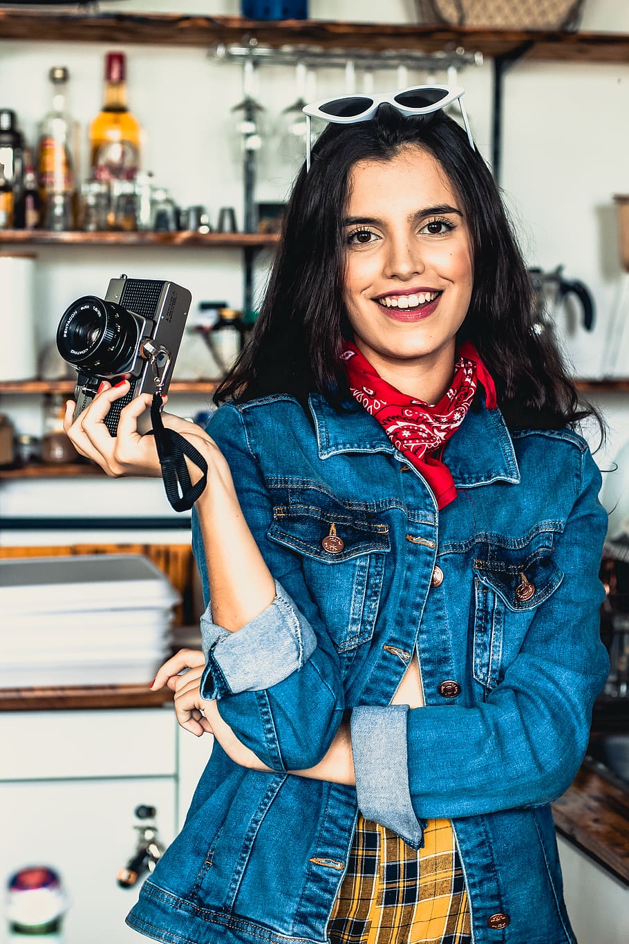 Woman Holding Camera, beautiful, beauty, brunette, fashion, indoors, HD wallpaper