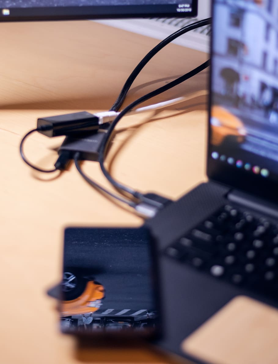 black Android smartphone on the laptop computer, technology, connection HD wallpaper