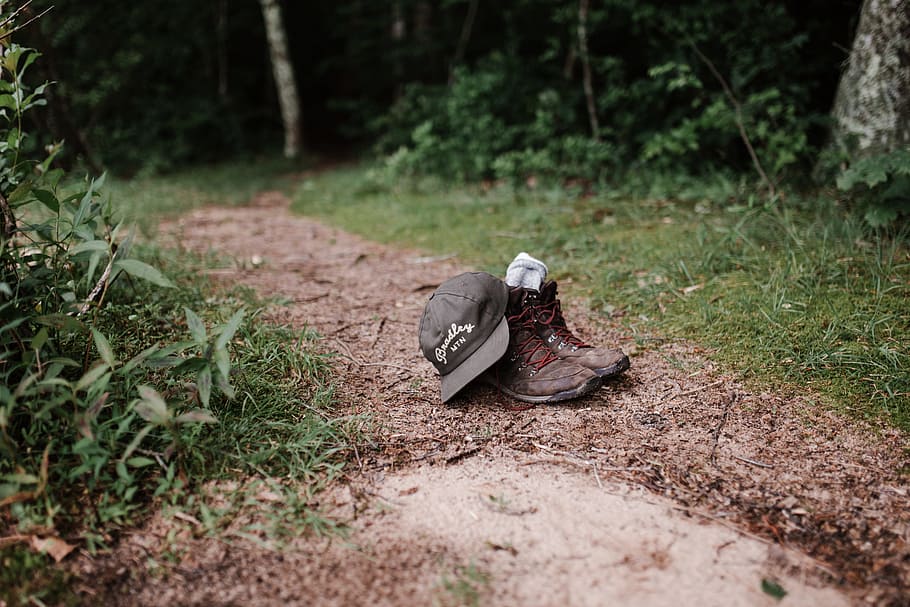 pair of brown boots and black fitted cap, plant, land, grass HD wallpaper