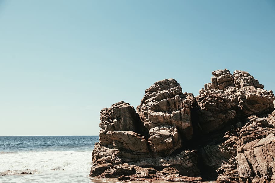 Waves crash against a large rock on the beach, Bay, Blue, Boulder HD wallpaper