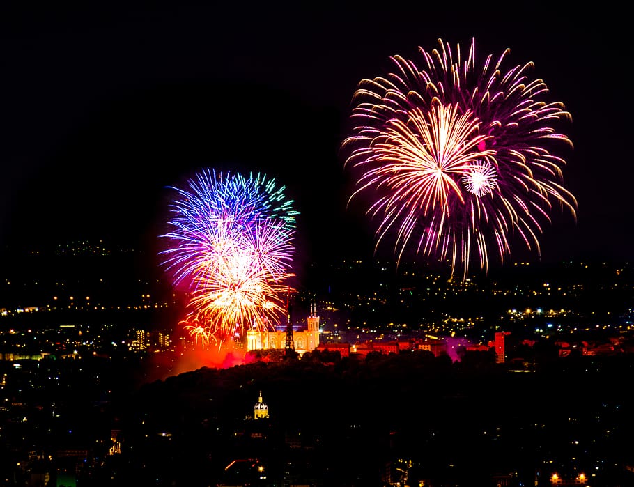 A colorful fireworks display at night in France., lyon, 14 juillet, HD wallpaper