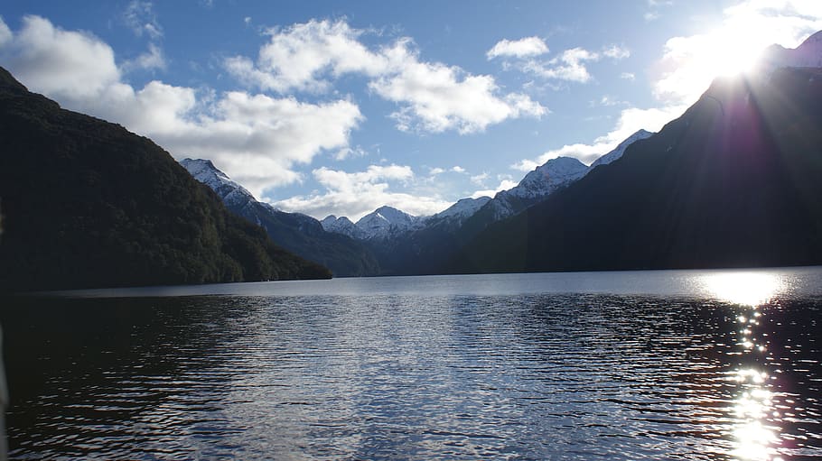 Landscape Photography of Mountain and Body of Water, clouds, daylight HD wallpaper