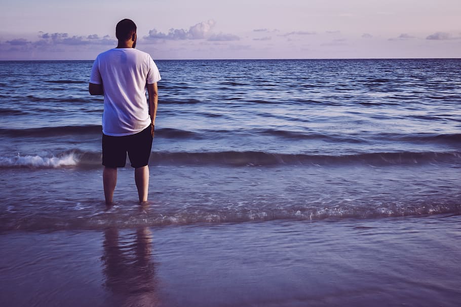 Photo of Man Standing On Seashore, back, back view, beach, environment