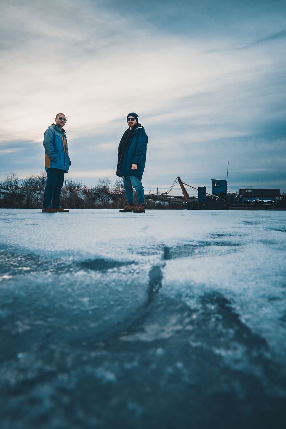 two men standing on snowy ground during daytime, human, person