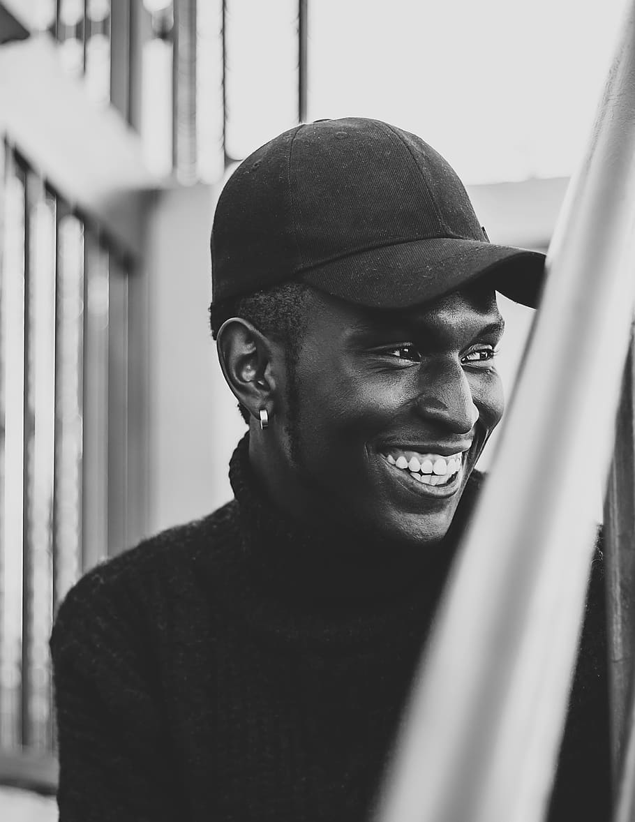 grayscale photo of man, male, railing, sat, sitting, hat, fashion HD wallpaper