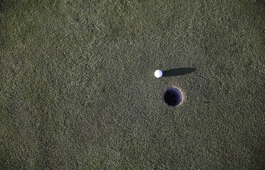 White Golf Ball Beside Golf Hole, golf course, grass, green, manicured HD wallpaper
