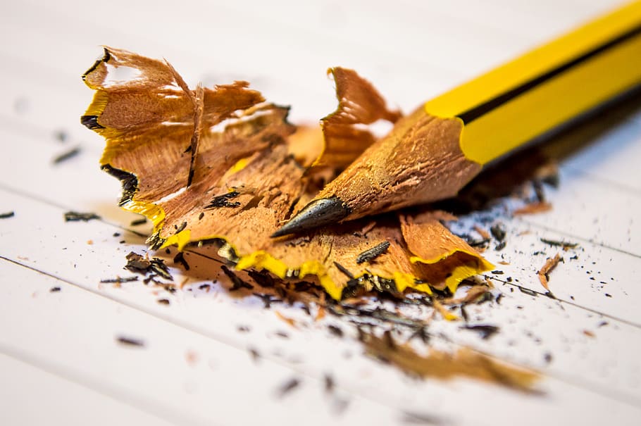 Yellow Black Pencil Sharpened Above the White Paper in Macro Photography HD wallpaper