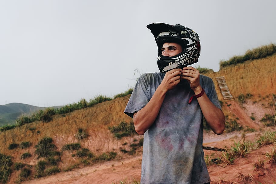 shallow focus photo of man wearing off-road motorcycle helmet, HD wallpaper