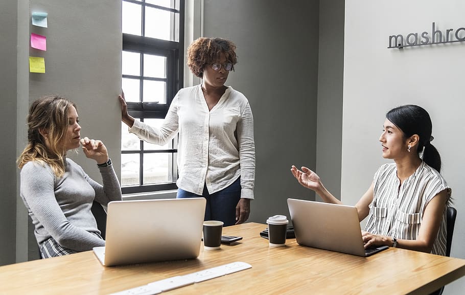 Three Women Inside Room, coffee, colleagues, digital device, discussing HD wallpaper