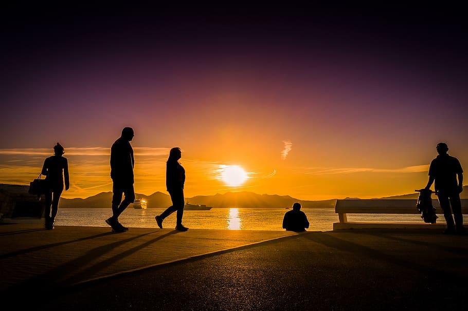 Silhouette Photography of People Near Body of Water, backlit HD wallpaper