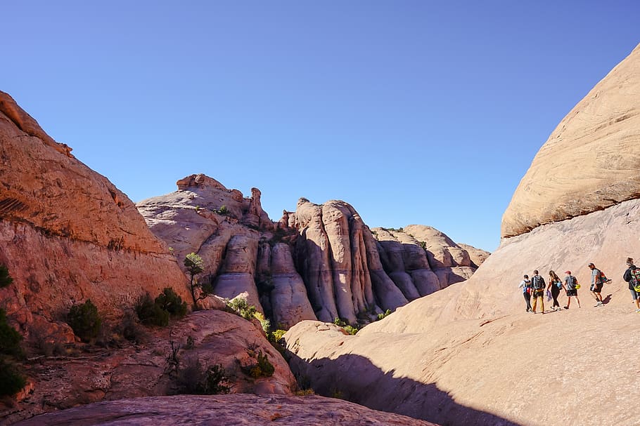 hiking, walking, row, mountain, rock, canyon, sky, rock formation HD wallpaper