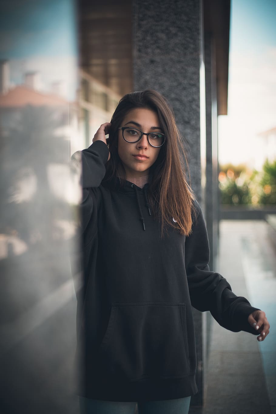 shallow focus photo of black pullover hoodie, glasses, one person, HD wallpaper