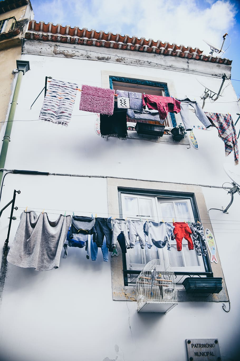 assorted clothes lot in box, building exterior, architecture HD wallpaper