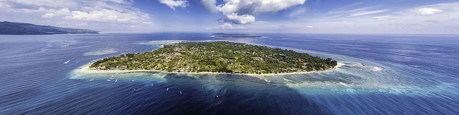 aerial photo of island under cloudy sky at daytime, coast, water
