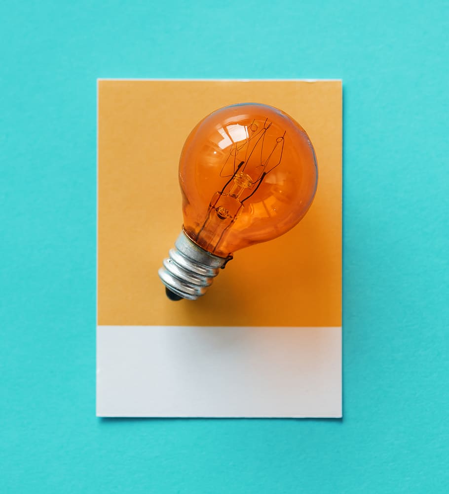 Edison Bulb On Paper, innovation, lightbulb, orange, colored background HD wallpaper