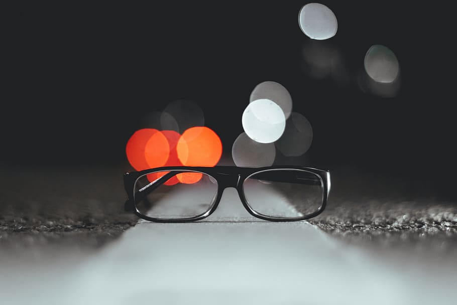 eyeglasses, frame, lens, bokeh, light, dark, night, floor, no people HD wallpaper