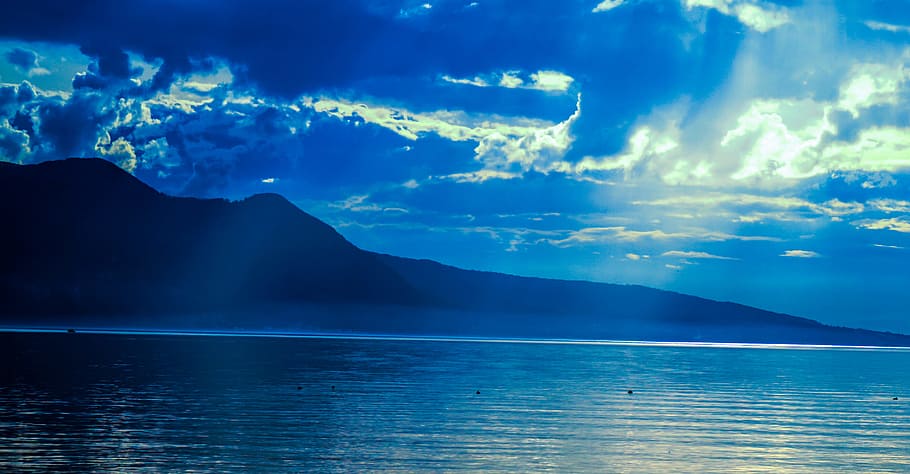Silhouette of Mountain Near Water at Daytime, beach, blue, clouds HD wallpaper