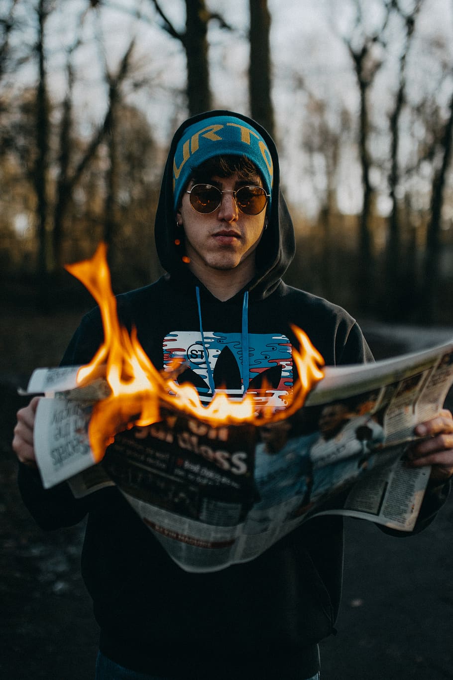 man holding burning newspaper, one person, real people, front view HD wallpaper