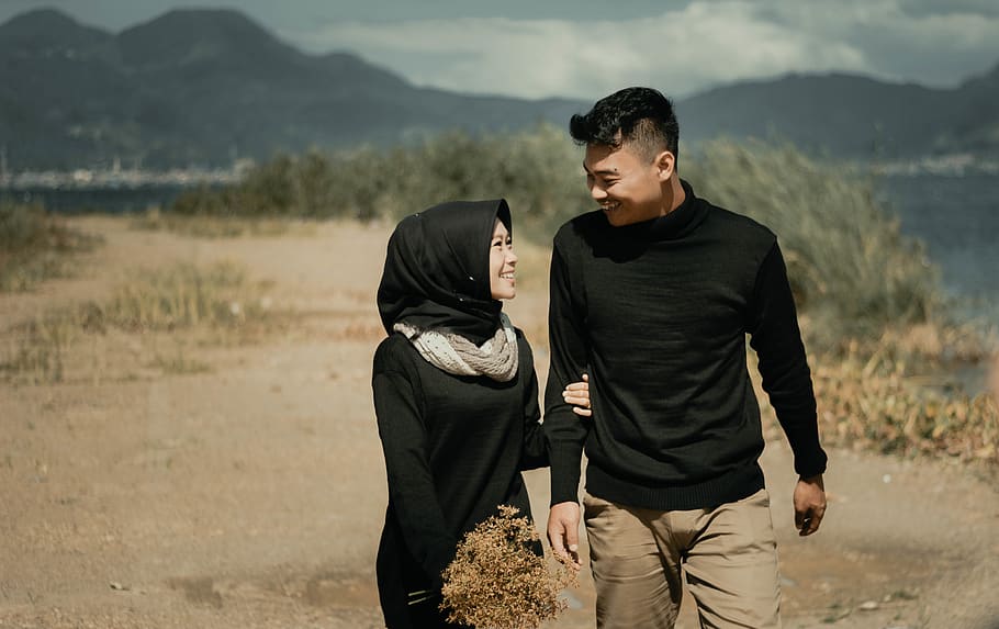 couple walking on field, human, person, clothing, apparel, outdoors HD wallpaper