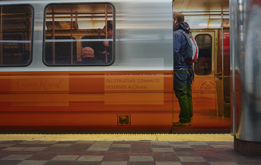 man riding train, public transportation, mode of transportation HD wallpaper