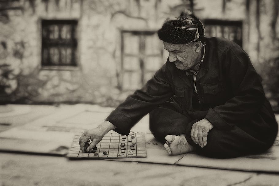 Man in Cross Sitting Position Outdoors, board game, elder, elderly HD wallpaper