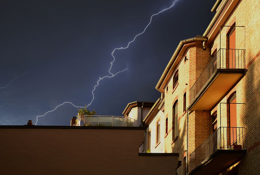 Yellow Building Under Thunderstorm in Black Sky, architecture HD wallpaper
