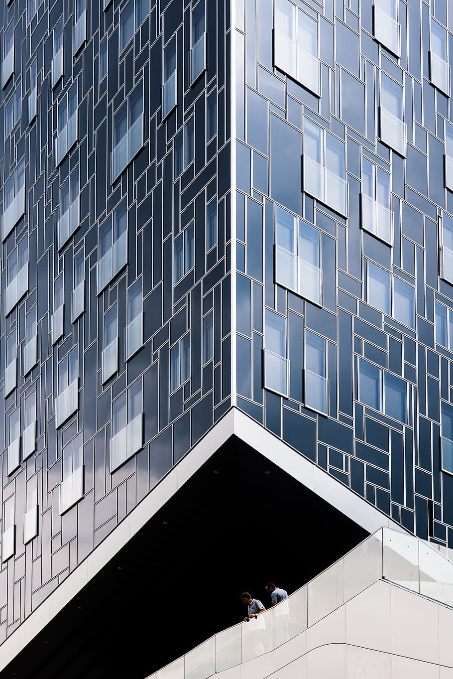 two men on building during daytime, person, wall, window, high rise HD wallpaper