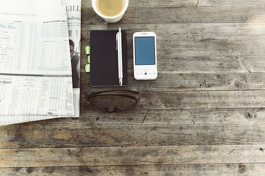 pen beside mobile phone on wooden surface, storage, designer HD wallpaper