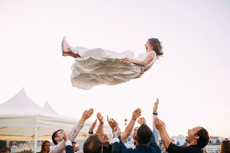 people lifting woman in the air, person, human, wedding, leisure activities