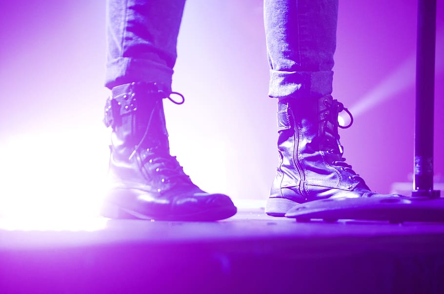 Person Wearing Lace Up Boots Standing on Stage, feet, glare, night HD wallpaper