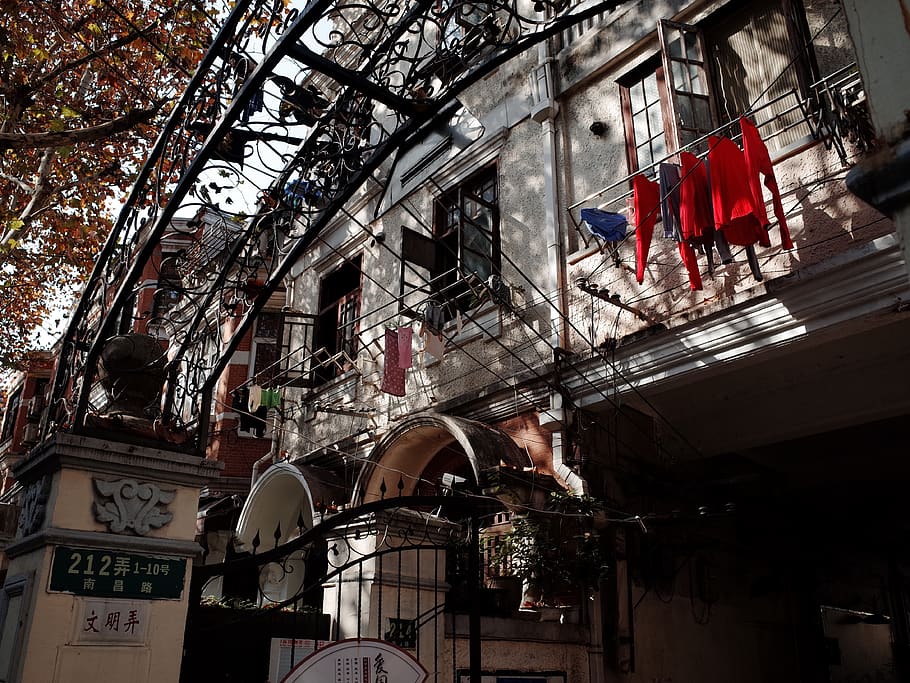 red clothes hanging beside building, window, architecture, symbol HD wallpaper