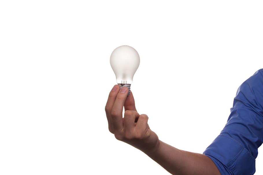 Midsection of Man Holding Hands over White Background, bulb, conceptual HD wallpaper