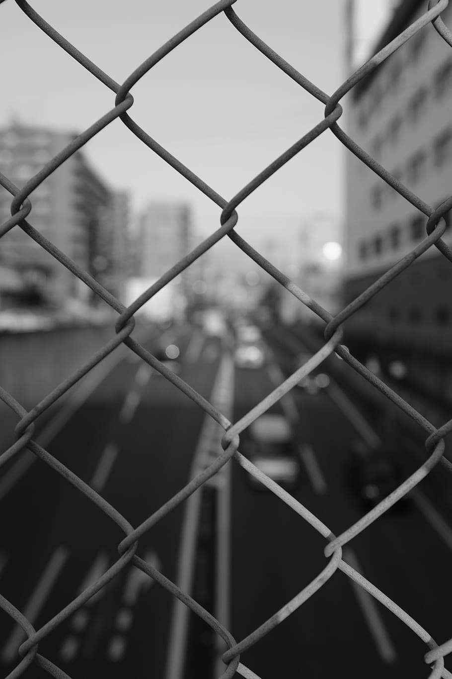 grayscale cyclone fence, prison, railing, grille, bokeh, city HD wallpaper