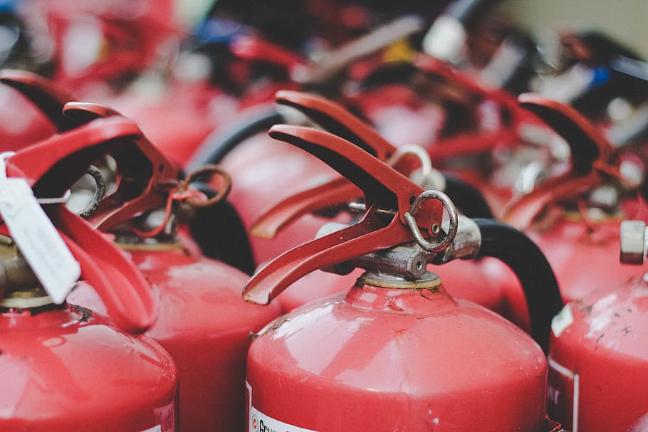 Red Fire Extinguisher Lot, blur, bright, close-up, colors, focus on foreground, HD wallpaper
