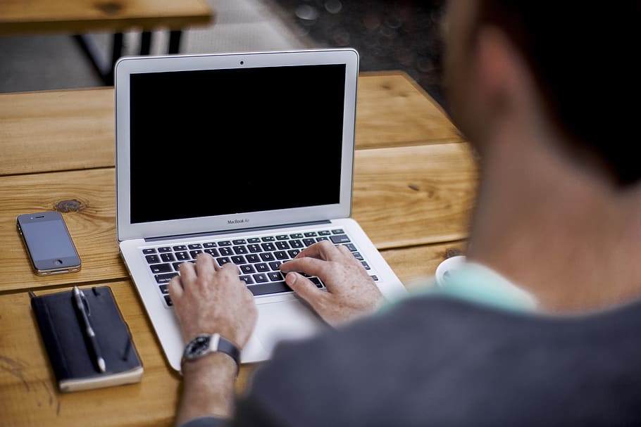 man using MacBook Air, technology, computer, communication, laptop HD wallpaper
