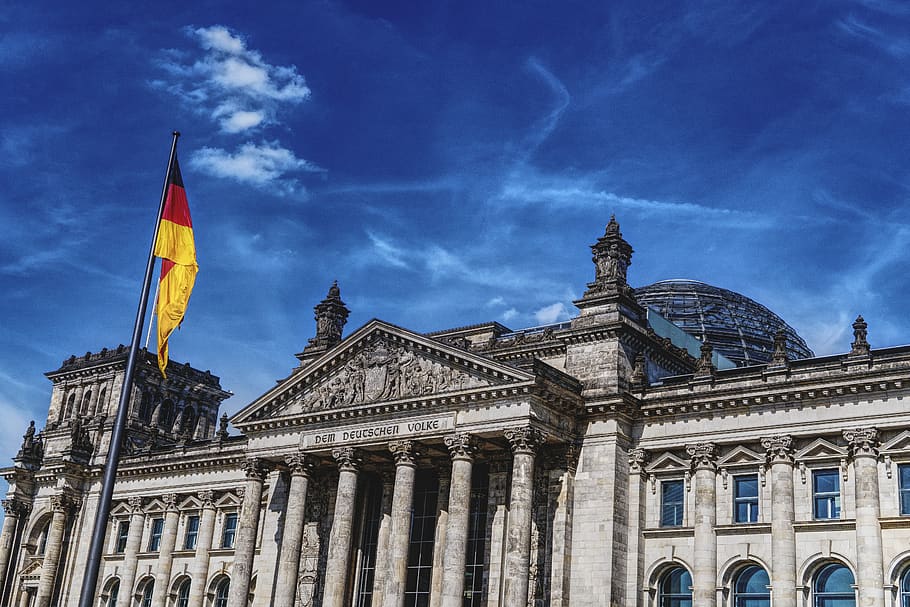 Red and Yellow Flag, architecture, blue, blue sky, building, clouds HD wallpaper