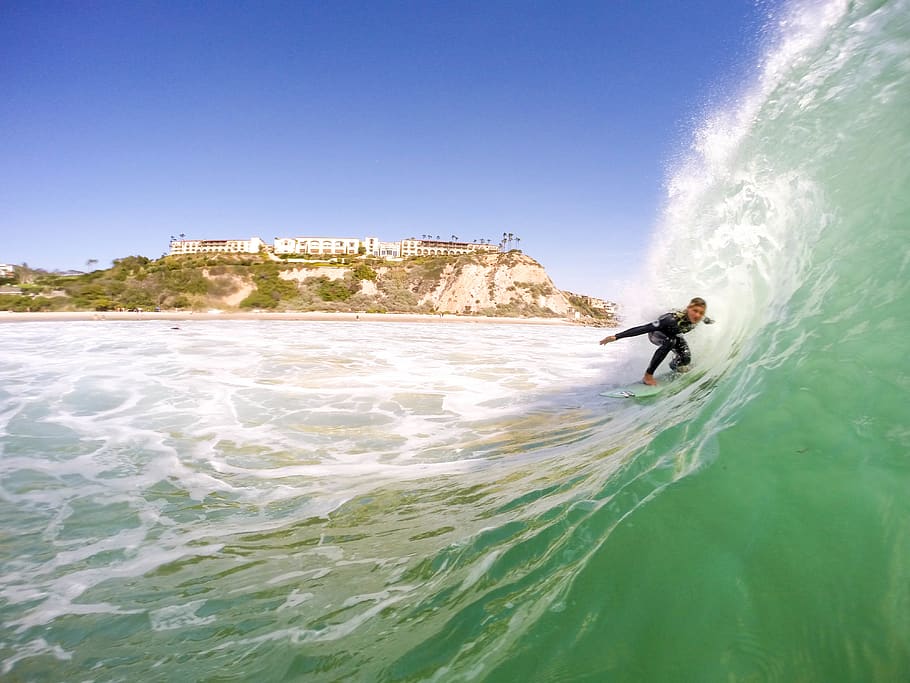 A man surfing a big wave., united states, orange county, barrel HD wallpaper