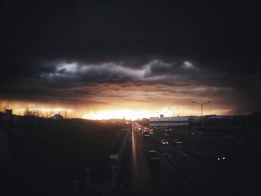 light breaks during dawn over city, nature, weather, road, outdoors HD wallpaper