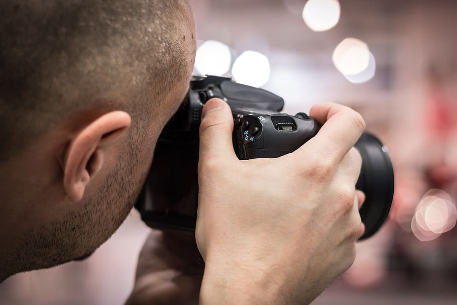 Person Taking a Photo, camera, close-up, hand, man, photographer HD wallpaper