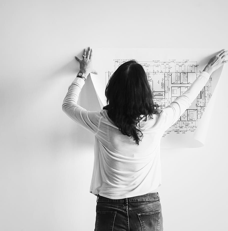 Woman Putting Map on Wall, alone, architect, back, black and white HD wallpaper