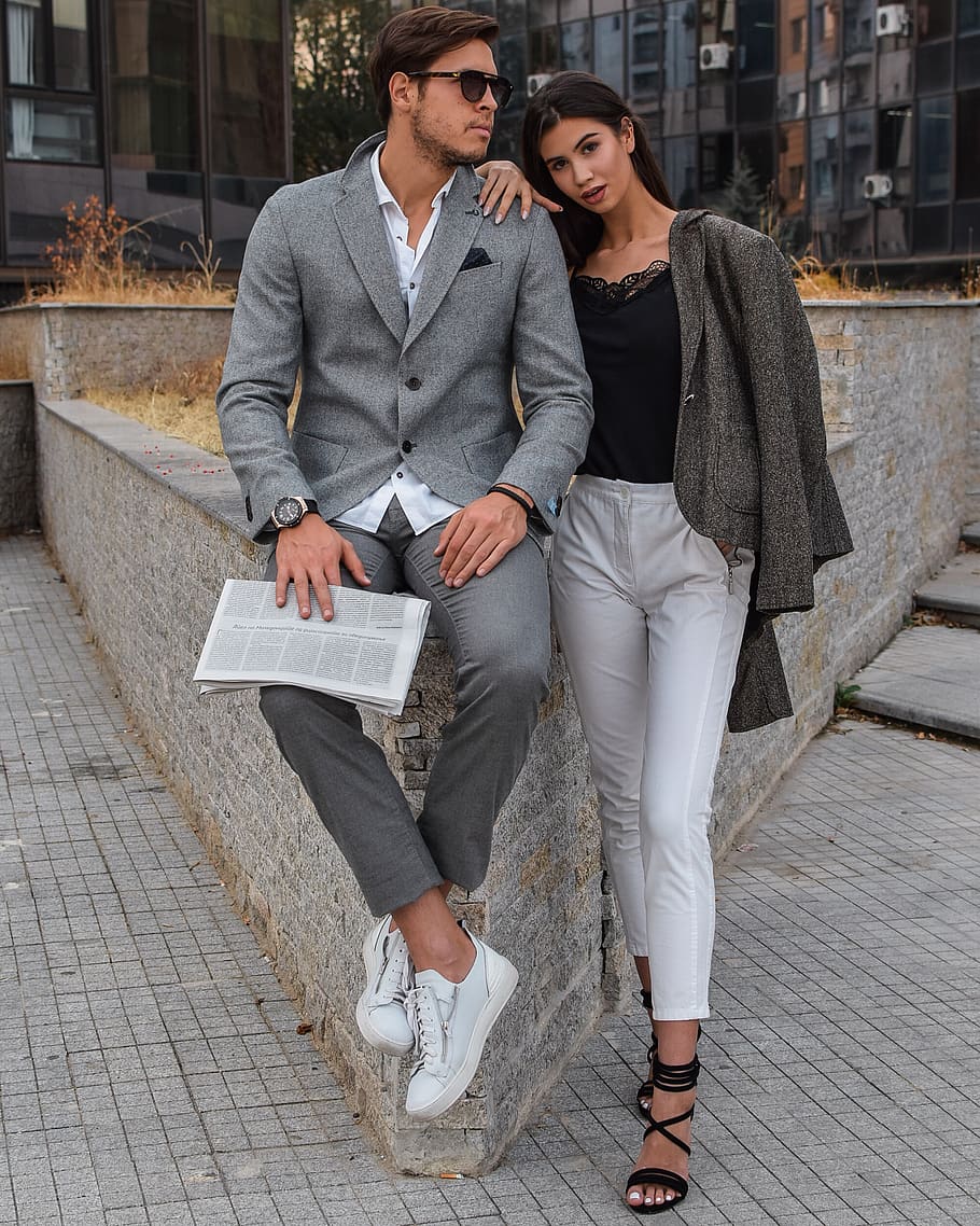 Woman Holding Man, beautiful, couple, fashion, fashionable, pavement, HD wallpaper