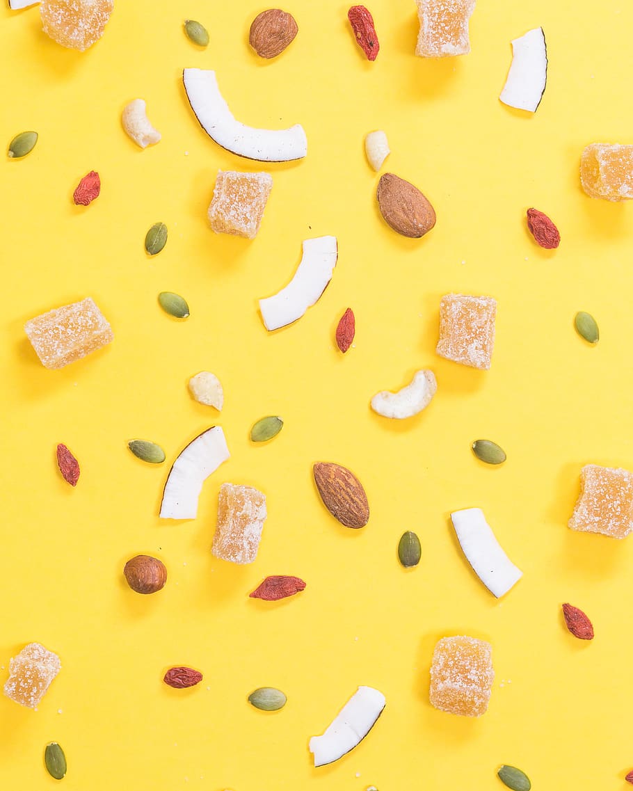 nuts and beans on yellow surface, food, food and drink, freshness HD wallpaper