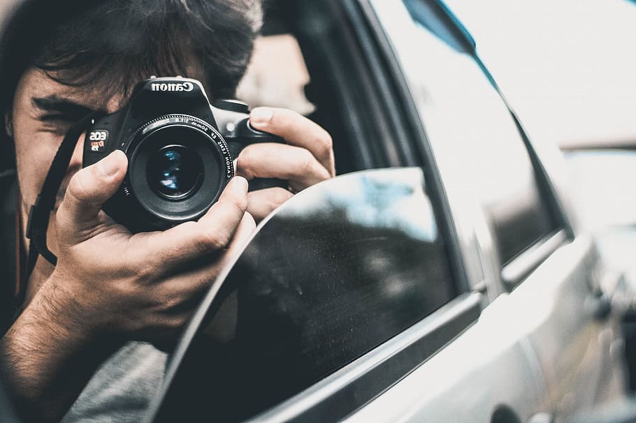 Man Holding Canon Camera Inside Car While Capturing a Photo, adult, HD wallpaper
