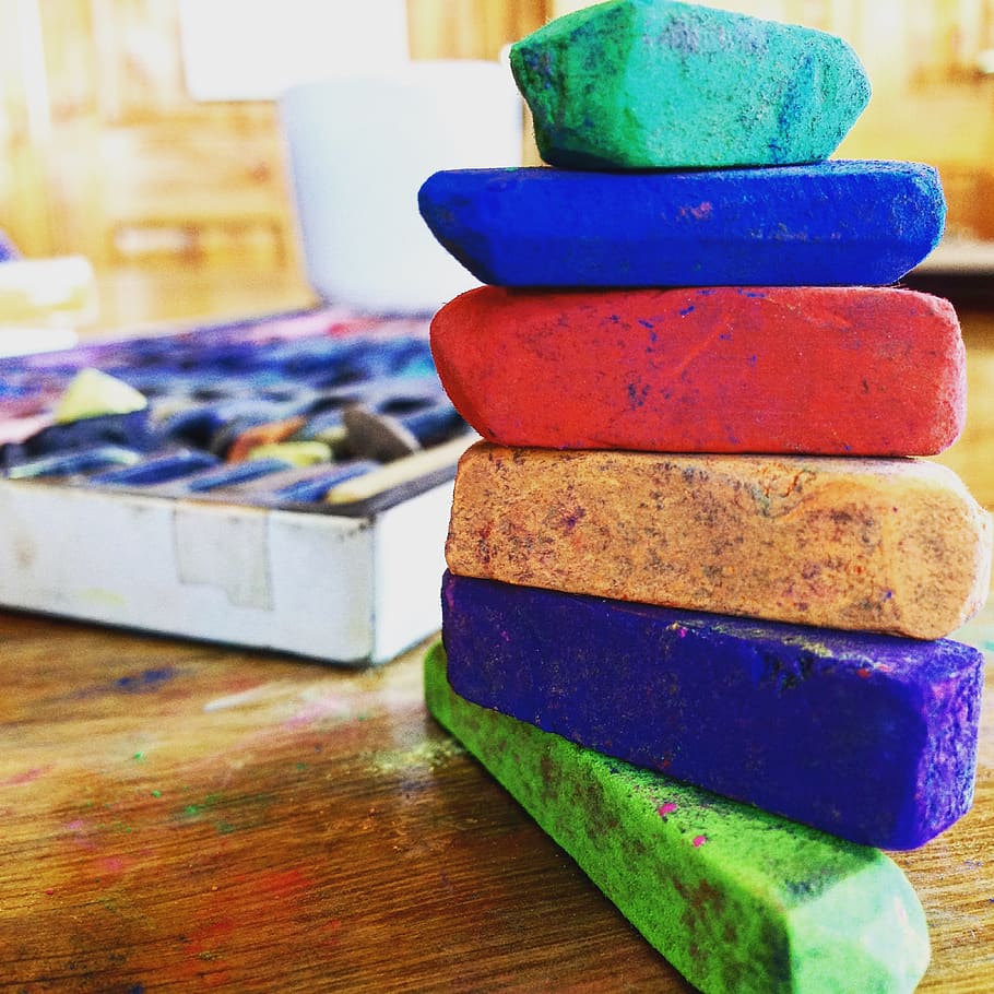 art, multi colored, table, stack, indoors, still life, no people HD wallpaper