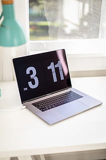 MacBook Pro on white wooden surface, laptop, desk, lamp, computer HD wallpaper