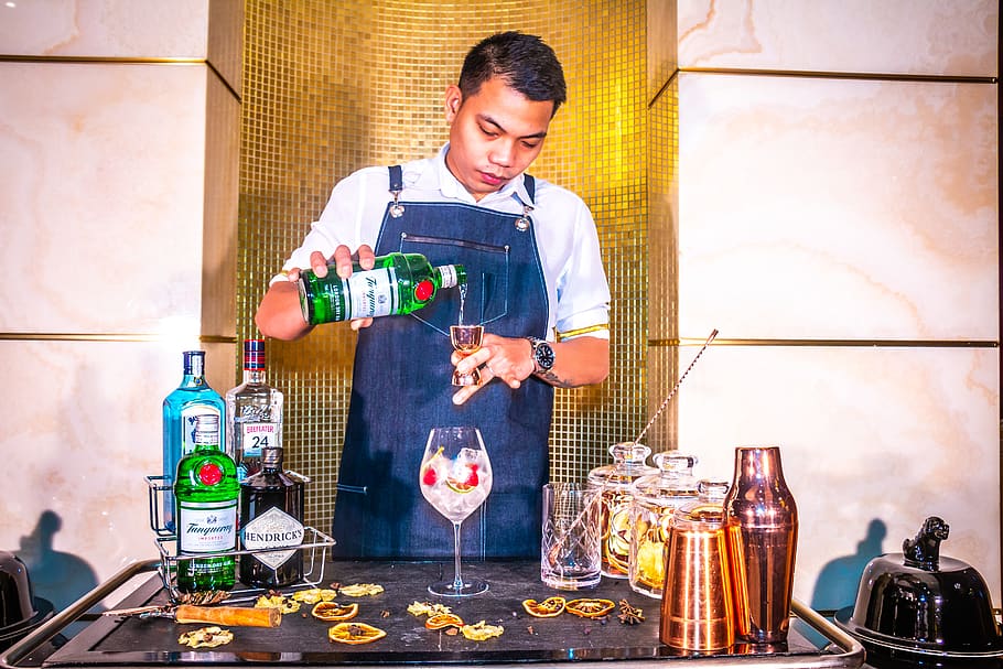 man standing while mixing cocktail, one person, holding, indoors HD wallpaper