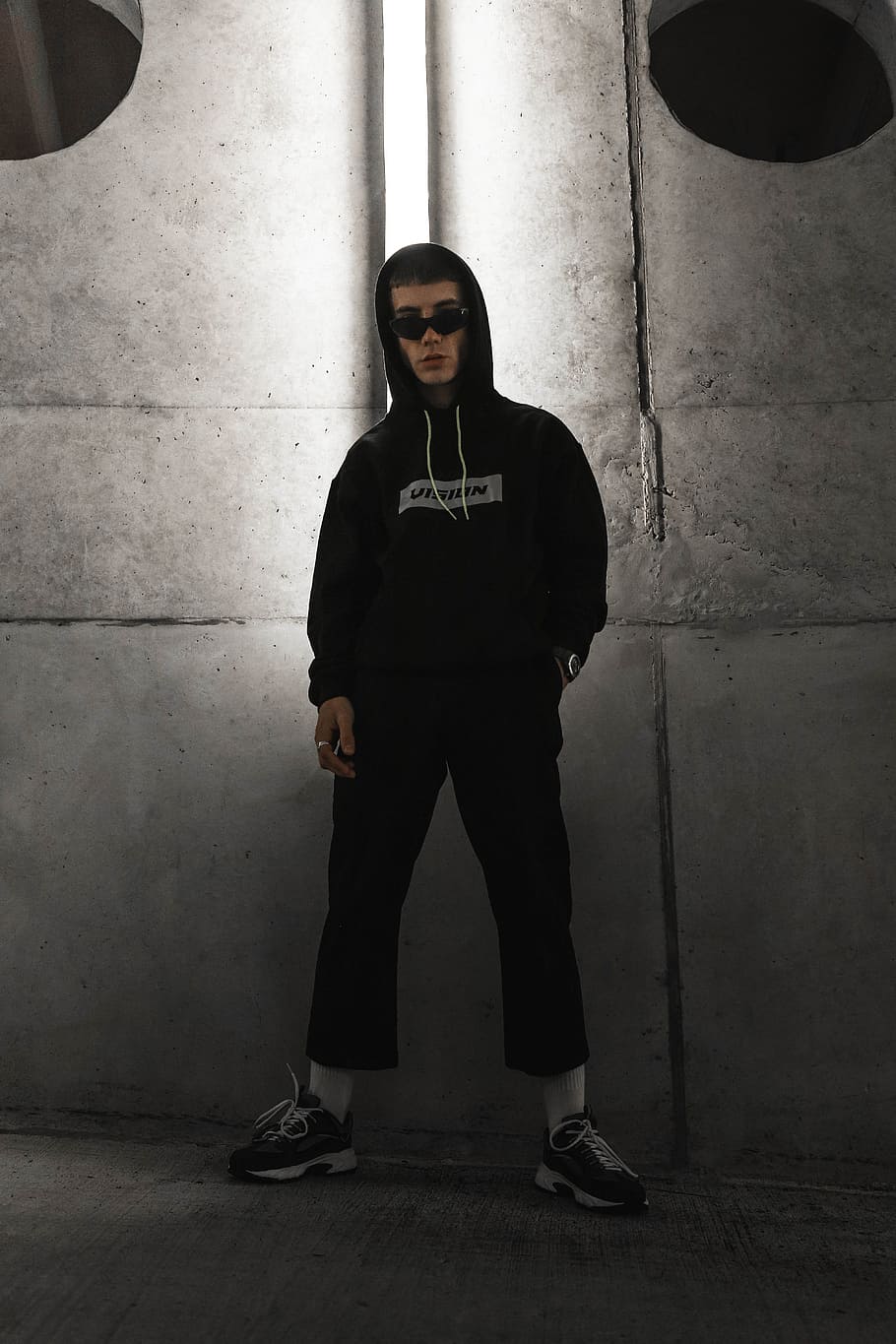 man wearing hoodie standing in front of wall, led, light, instagram HD wallpaper