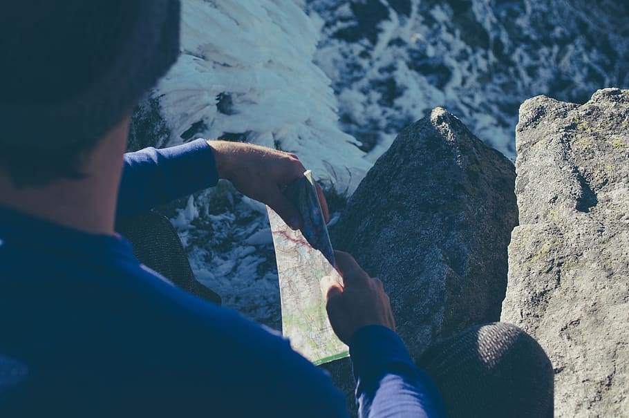 hiker, rest, break, summit, peak, top, map, rocks, mountain HD wallpaper